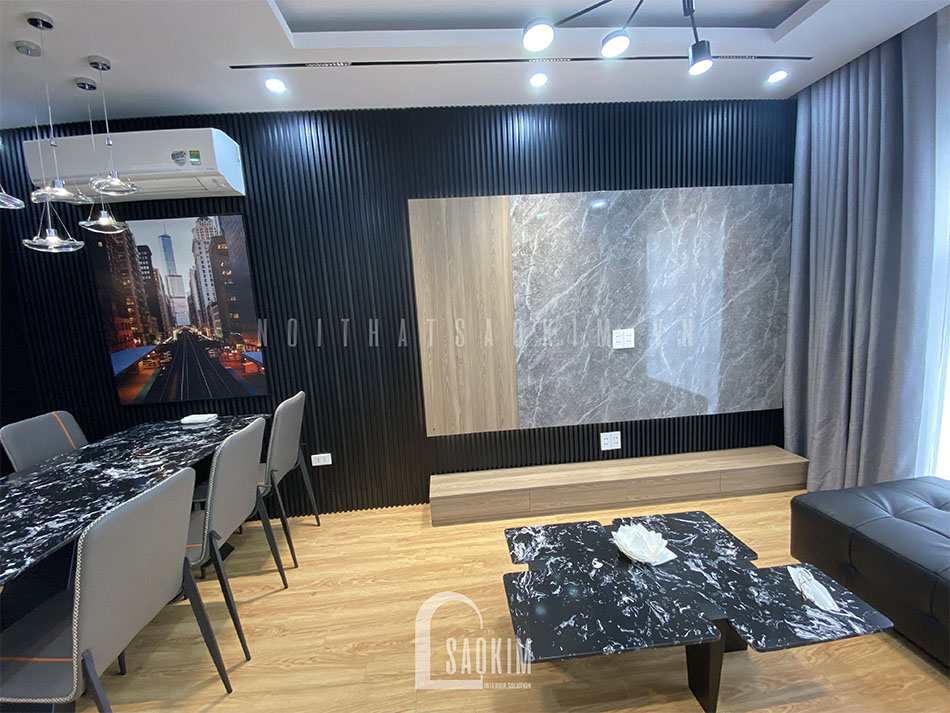 Vách ti vi kết hợp giữa chất liệu gỗ và đá mang đến vẻ đẹp sang trọng