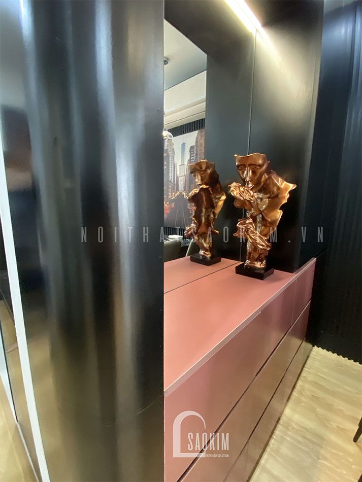 Thiết kế thi công nội thất chung cư Lotus Central bố trí hệ tủ đa năng ngay sát vách ngăn bếp và bàn ăn