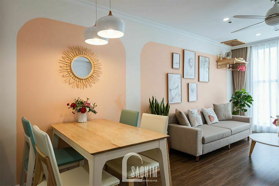 Thi công phòng khách chung cư Sunshine Garden tạo không gian mở với bàn ăn và bếp giúp căn hộ trở nên rộng thoáng hơn