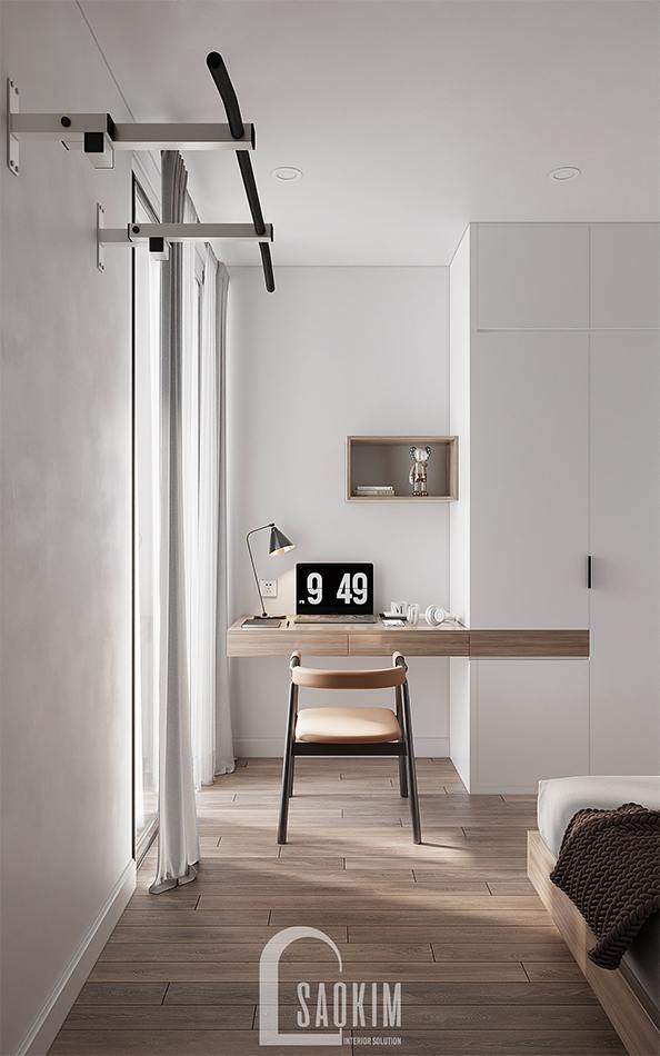 Bàn học đặt sát cửa sổ để đón ánh sáng tự nhiên