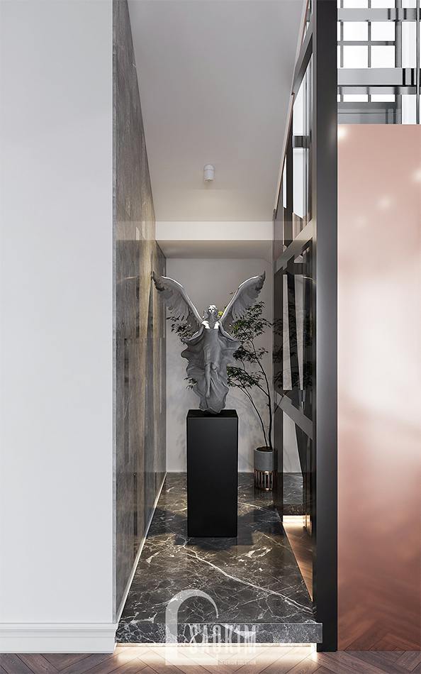 Tượng trang trí đặt giữa khoảng trống của tường và thang máy