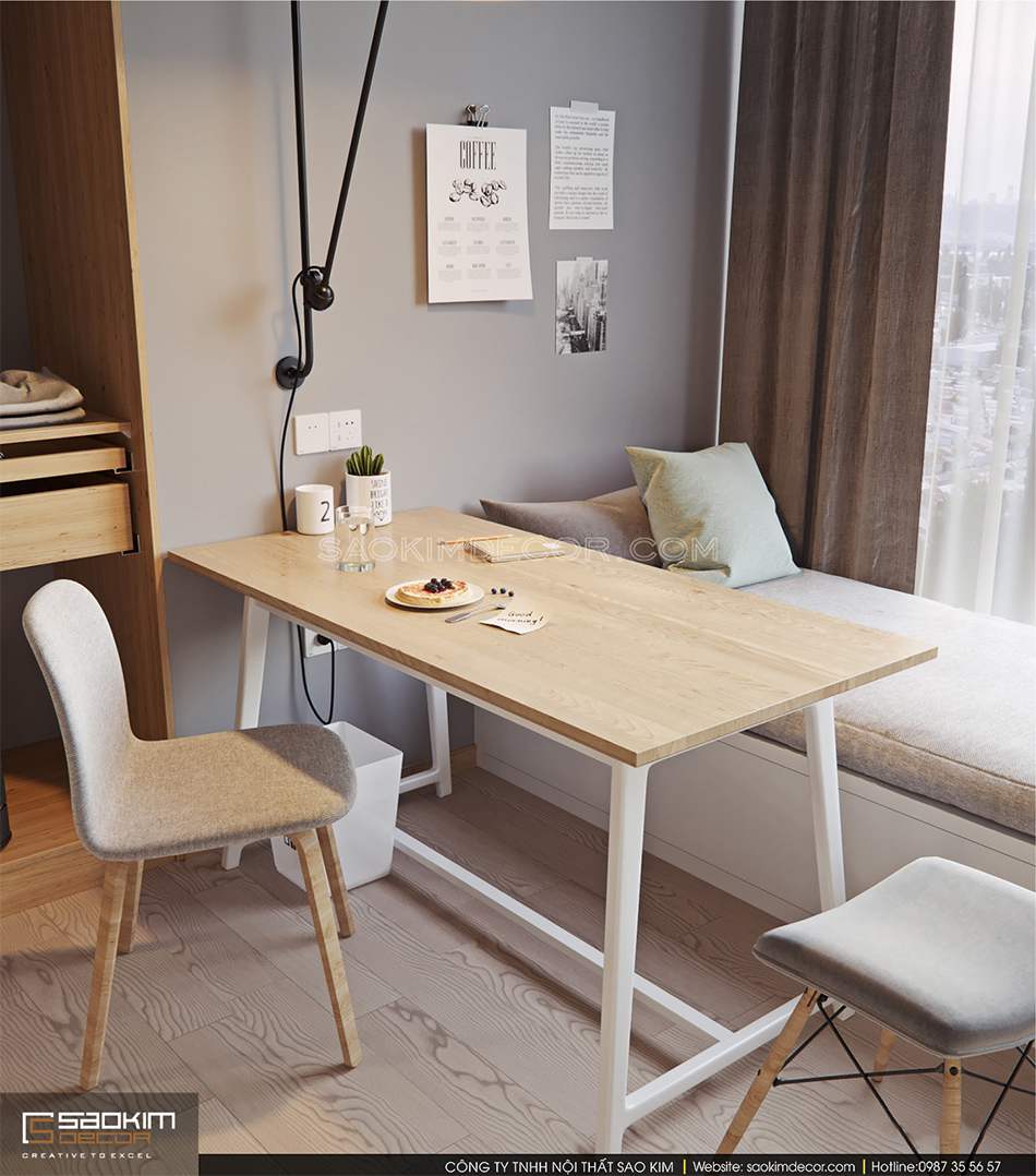 Chiếc bàn ăn đồng thời tận dụng làm bàn làm việc, đọc sách