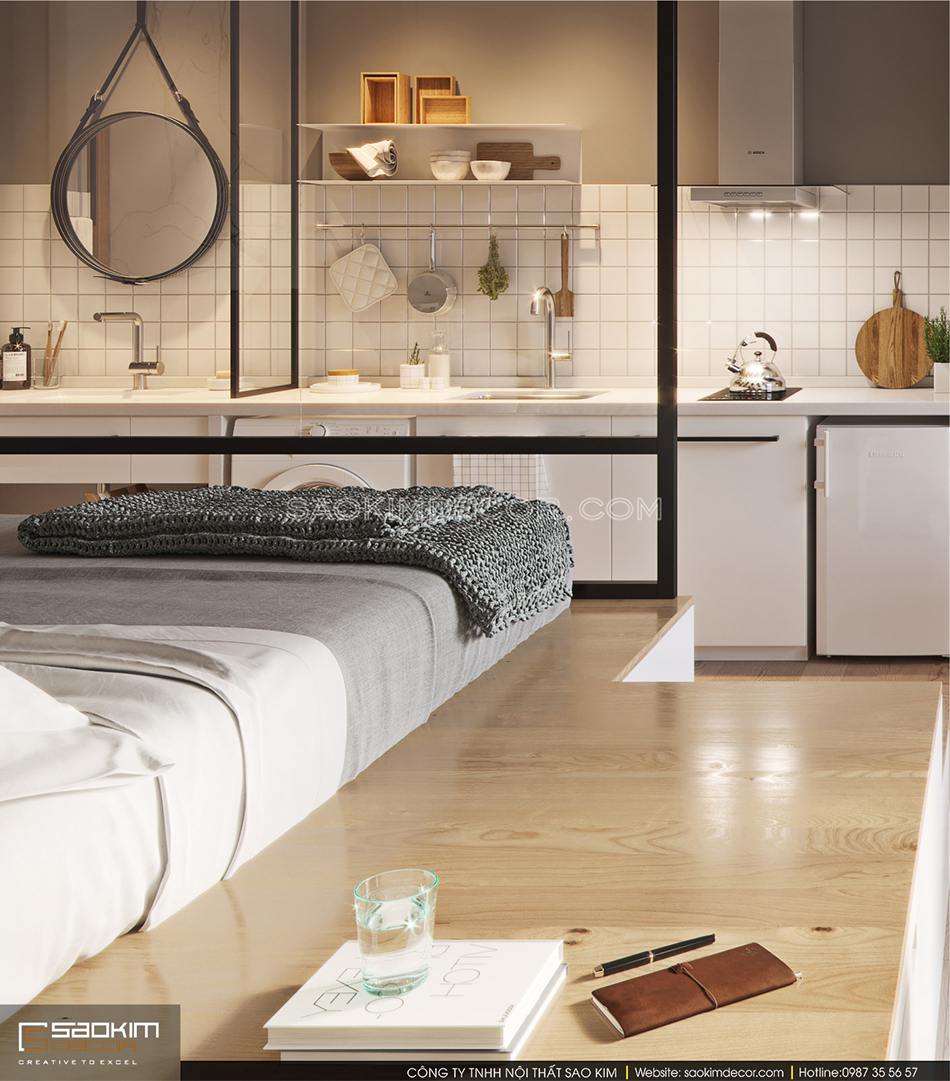 Khu vực giường ngủ được làm cao trên sàn gỗ và ngăn cách với các không gian khác bằng kính trong suốt